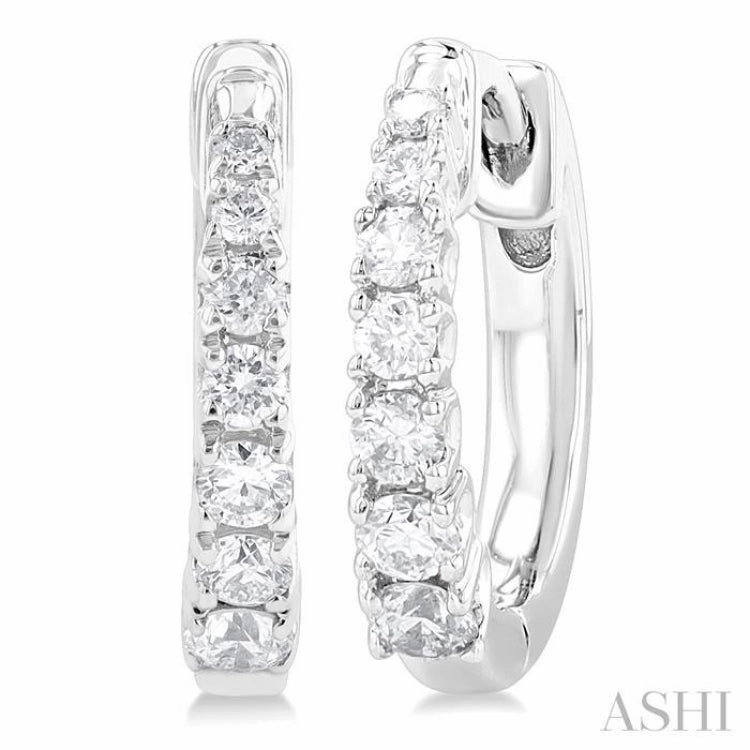 1/4 Ctw Graduated Round Cut Diamond Fashion Huggie Petites in 10K White Gold Polished Look Anniversary Surprise