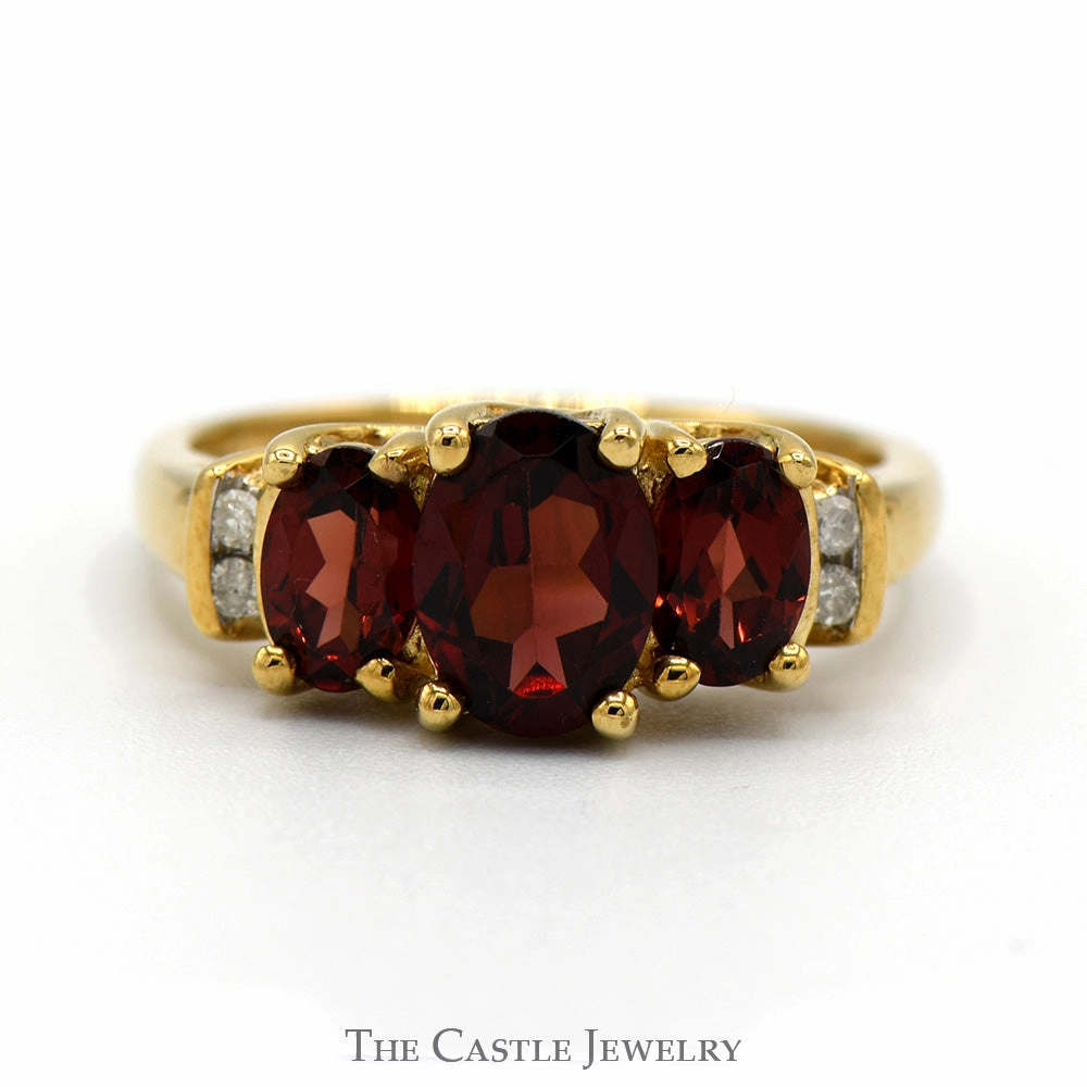 3 Stone Oval Garnet Ring with Diamond Accents in 10k Yellow Gold Timeless Piece Modern Wear