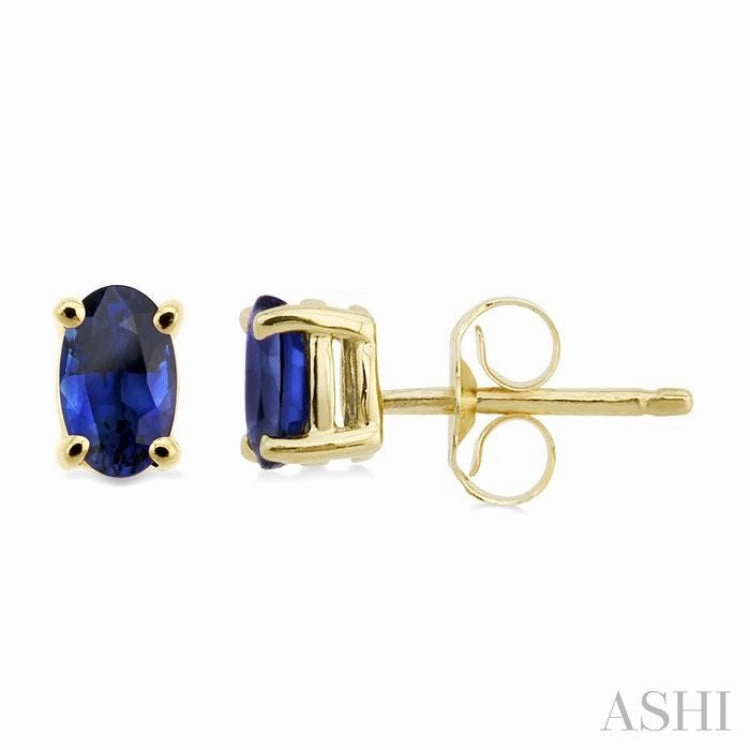 Balanced Accent 5x3 MM Oval Cut Sapphire Stud Earrings in 14K Yellow Gold