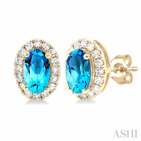 Distinctive Touch 5x3 MM Oval Shape Blue Topaz and 1/8 Ctw Single Cut Diamond Halo Semi-Precious Stud Earrings in 10K Yellow Gold