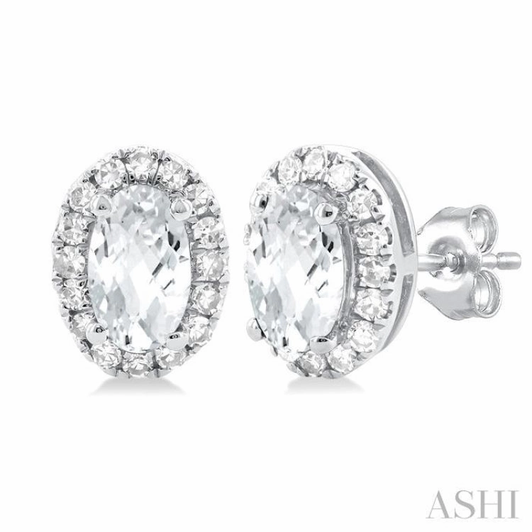 Elegant Layer Soft Features 5x3 MM Oval Shape White Topaz and 1/8 Ctw Single Cut Diamond Halo Semi-Precious Stud Earrings in 10K White Gold