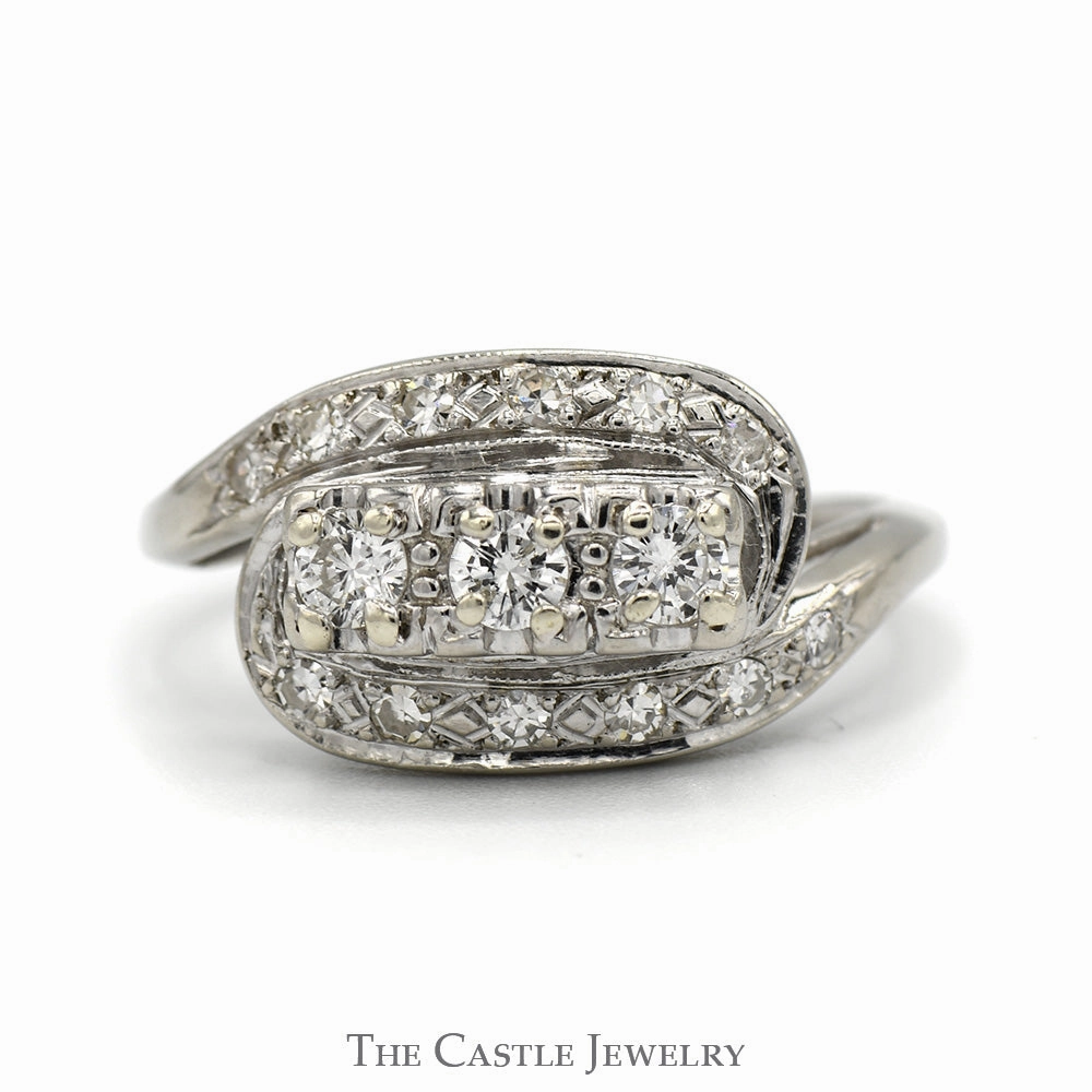 Special Look Antique Style 1/2cttw Three Stone Diamond Ring with Diamond Accents in 14k White Gold Bypass Design