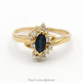 Marquise Cut Sapphire Ring with Diamond Accents in 14k Yellow Gold Bypass Mounting Timeless Structure