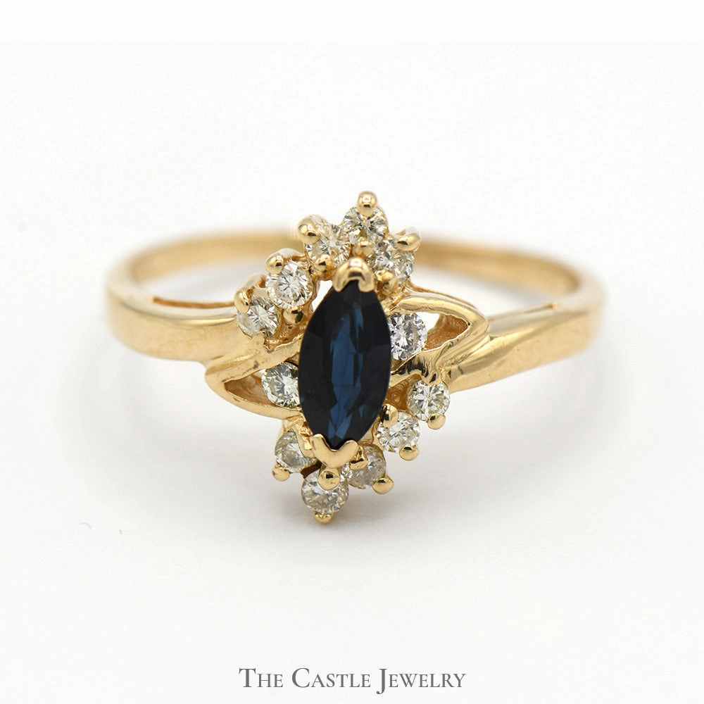 Marquise Cut Sapphire Ring with Diamond Accents in 14k Yellow Gold Bypass Mounting Timeless Structure