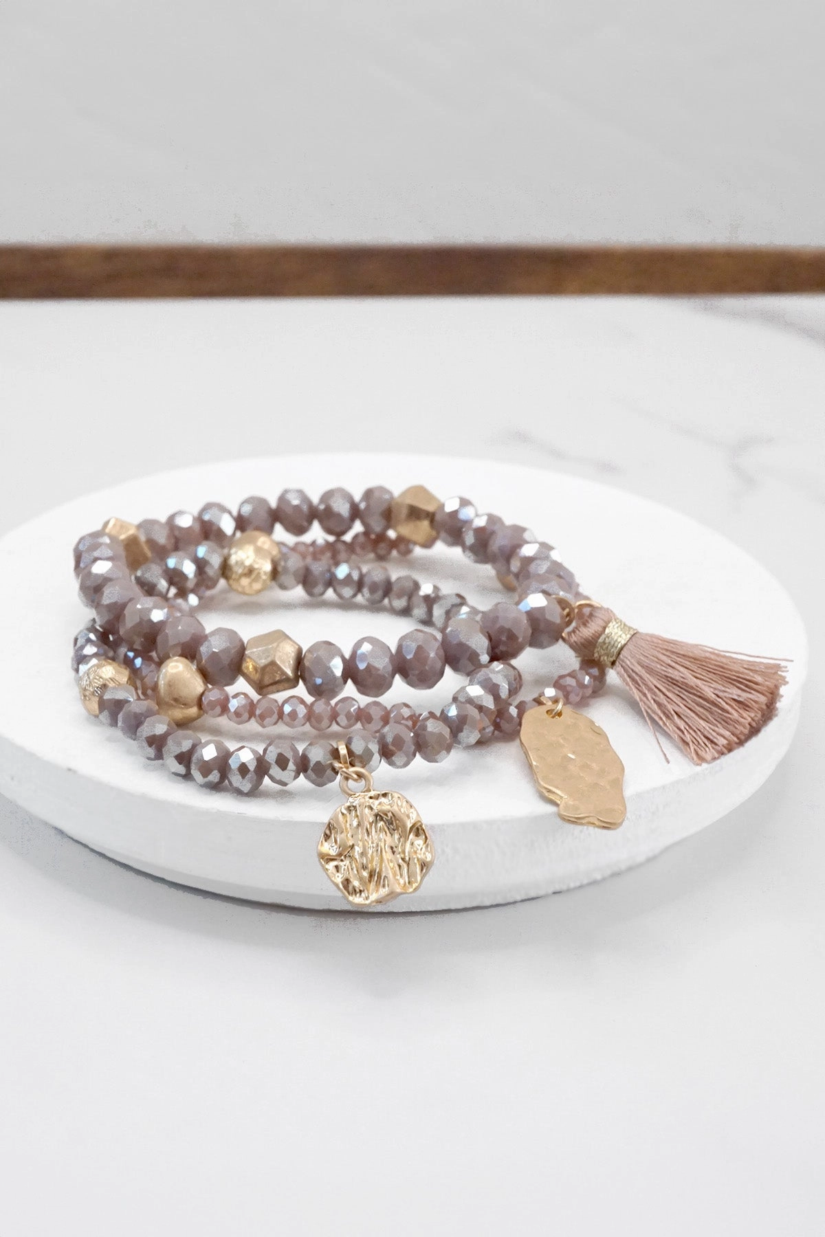 Aristocratic Charm Angelic Amalgamations Beaded bracelet stack with tassel and coins Aqua Taupe Rose