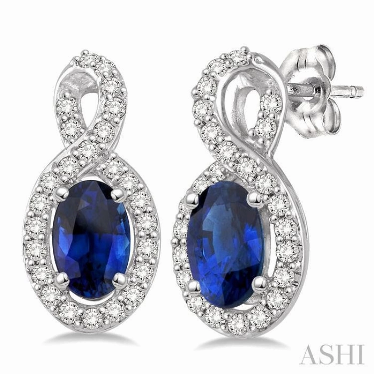 Contemporary Look Casual Spark 5x3 MM Oval Cut Sapphire and 1/5 ctw Round Cut Diamond Earrings in 14K White Gold