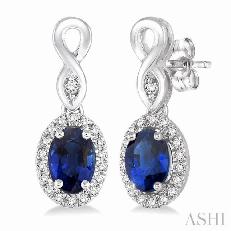5x3 MM Oval Cut Sapphire and 1/6 ctw Round Cut Diamond Earrings in 10K White Gold Structured Shape