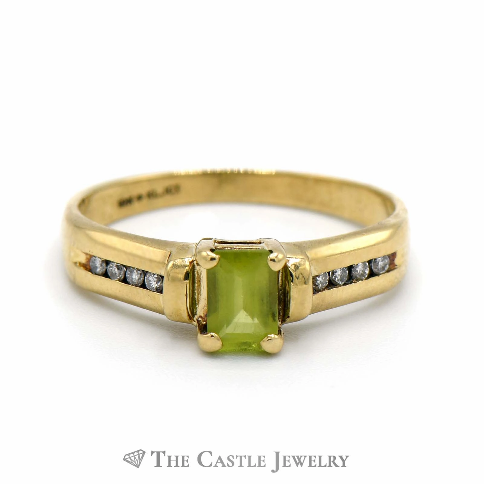 Emerald Cut Peridot Ring with Channel Set Diamond Accented Sides in 10k Yellow Gold Modern Interpretation