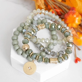 Beaded bracelets set in Olive green with a coin charm Quiet Luxury Second-To-None