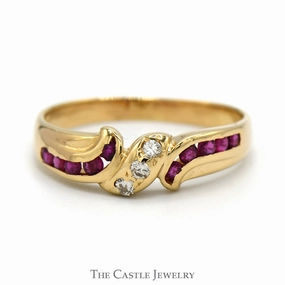 Artistic Sign Processed Item Triple Diamond Ring with Channel Set Ruby Sides in 14k Yellow Gold Bypass Band
