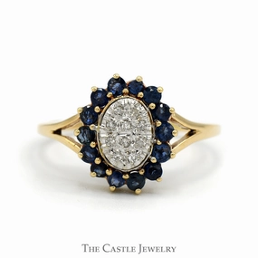 Designer Ornament Sapphire and Diamond Cluster Ring With Round Sapphires and .05 CTTW Round Brilliant Cut Diamonds in Split-Shank 10 KT Yellow Gold