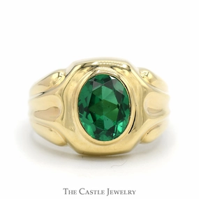 Oval Bezel Set Synthetic Emerald Ring with Concaved Grooved Sides in 10k Yellow Gold Travel Friendly Rural Elegance