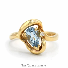 Premium Object Comfortable Piece Pear Shaped Blue Topaz Ring with Diamond Accent in Freeform Swirled 14k Yellow Gold Mounting