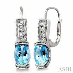 Contemporary Glow 7x5 MM Oval Shape Aquamarine and 1/6 ctw Round Cut Diamond Earrings in 14K White Gold