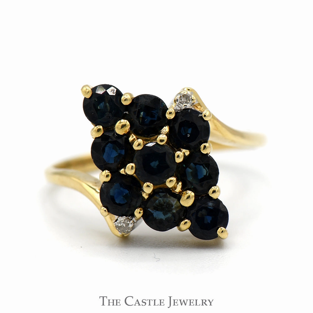 Custom Piece Trendy Vibe Marquise Shaped Sapphire Cluster ring with Diamond Accents in 14k Yellow Gold Bypass Setting