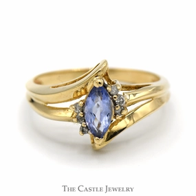 Casual Structure Simple Memento Marquise Shaped Tanzanite Ring with Diamond Accents and Split Shank Sides in 14k Yellow Gold