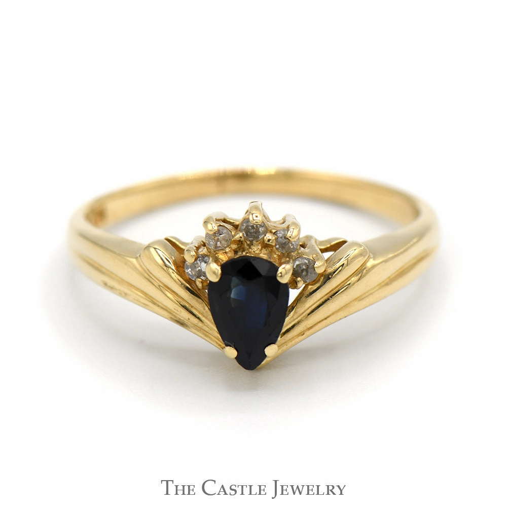 Designer Product Pear Shaped Sapphire Ring with Round Diamond Accents in 14k Yellow Gold