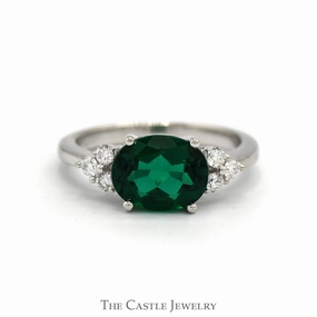 Side Set Oval Cut Lab Created Emerald Ring with Diamond Accents in 14k White Gold High-End Craft Excellent Art
