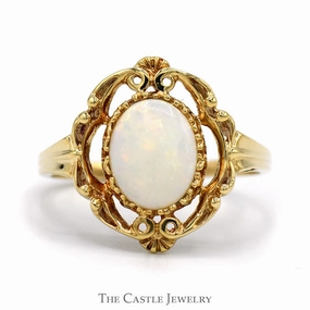 Oval Cut Opal Ring in 10k Yellow Gold Open Antique Style Mounting Balanced Motion