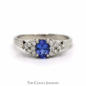 Oval Cut Tanzanite Ring with Diamond Cluster Accented Sides in 14k White Gold Understated Spark