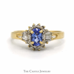 Fashion highlight Oval Cut Tanzanite Ring With Diamond Halo And Sides .20 CTTW In 14KT Yellow Gold