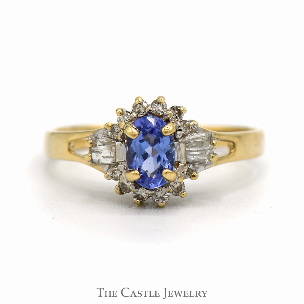 Fashion highlight Oval Cut Tanzanite Ring With Diamond Halo And Sides .20 CTTW In 14KT Yellow Gold