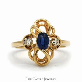 Simple Style Oval Sapphire Ring with Diamond Accents in Interweaving Looped Design in 14k Yellow Gold
