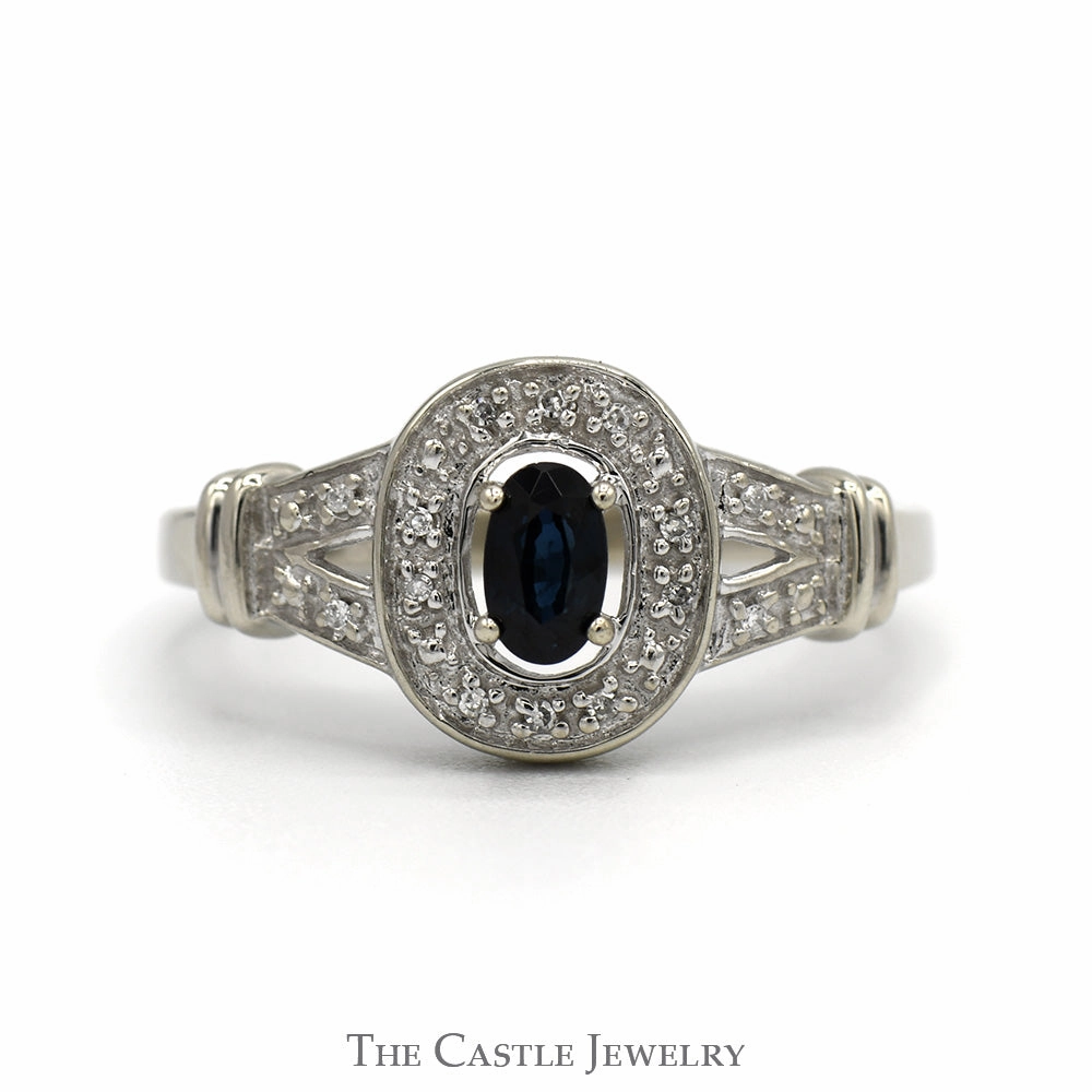 Oval Sapphire Ring with Illusion Set Diamond Halo and Accented Split Shank Sides in 10k White Gold investment piece