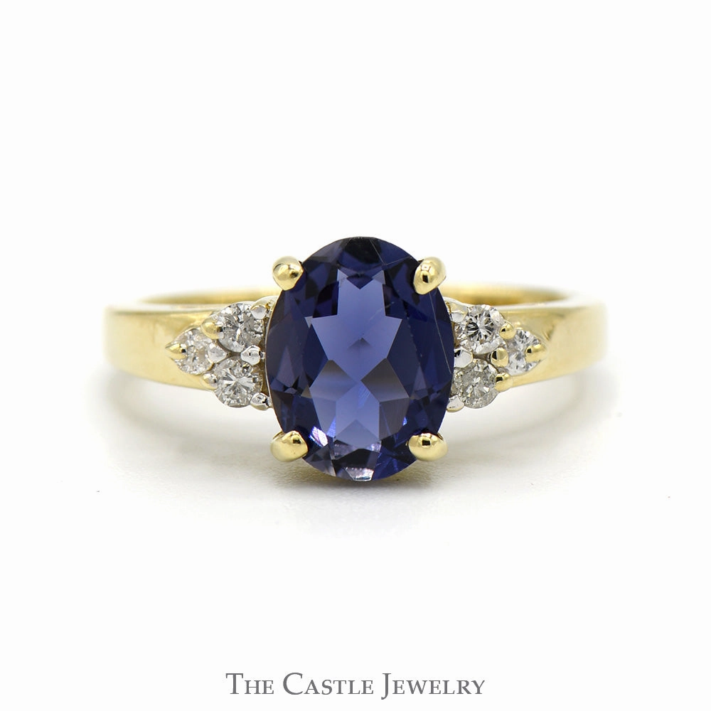 Excellent Item Oval Tanzanite Ring with Diamond Cluster Sides in 14k Yellow Gold