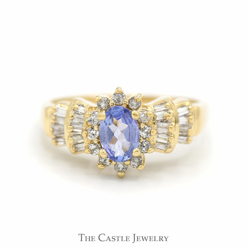 Affordable Emblem Beautiful Style Oval Tanzanite Ring with Diamond Halo and Baguette Cut Accented Sides in 14k Yellow Gold