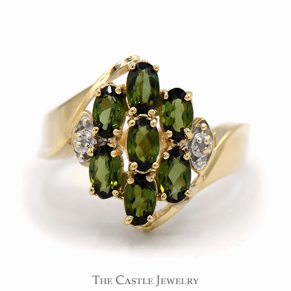 Anniversary Jewelry Luxury Article Oval Tsavorite Garnet and Diamond Cluster Ring With .01 CTTW in Bypass Style 10 KT Yellow Gold