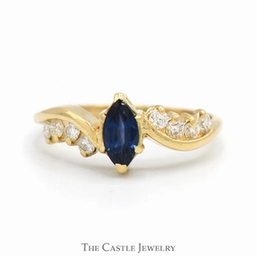 Quality Craft Marquise Cut Sapphire Solitaire Ring with Diamond Accented Curved Sides in 14k Yellow Gold