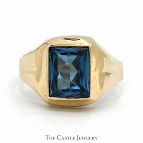 Rectangle Blue Topaz Ring with Grooved Sides in 10k Yellow Gold International Standard Low Maintenance