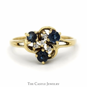 Round Sapphire and Diamond Cluster Ring with Split Shank Sides in 14k Yellow Gold Millennium Style Trend Accent