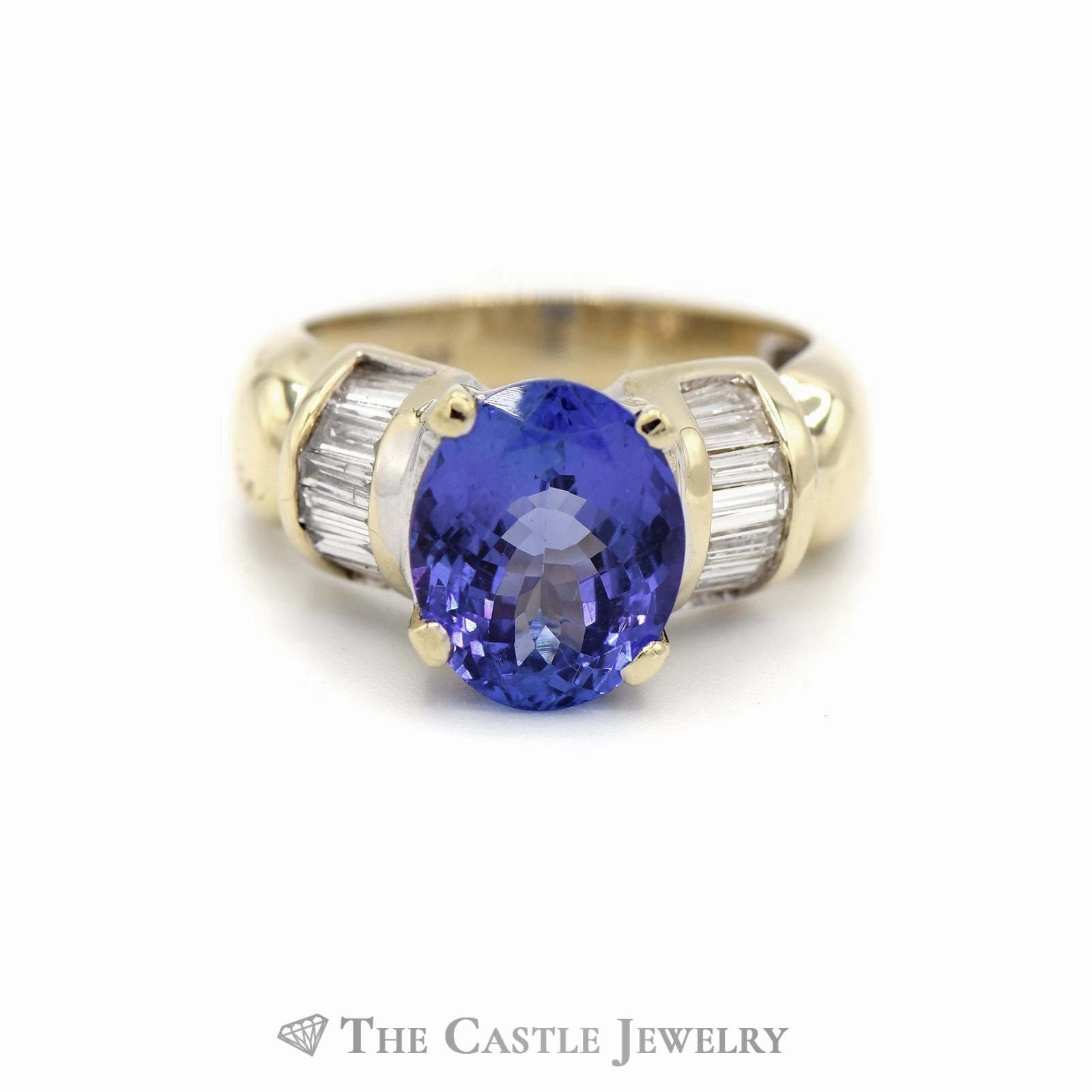 Oval Tanzanite Ring with Baguette Diamond Accents in 14k Yellow Gold Artistic Craft