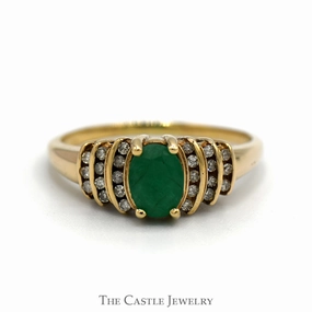 Vintage Style Oval Cut Emerald Ring with Channel Set Diamond Accents in 10k Yellow Gold Contemporary Art