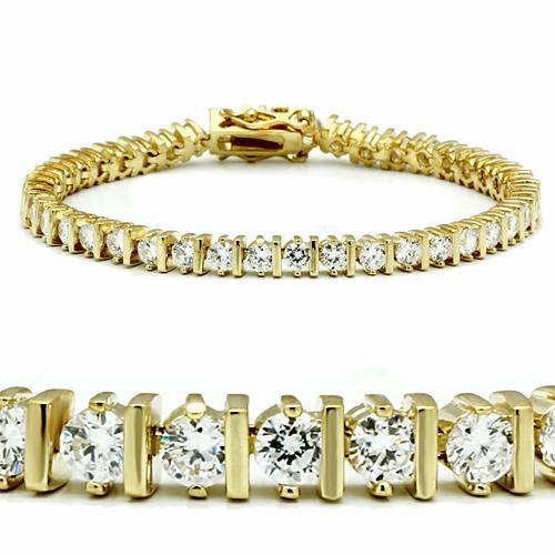 47205 - Gold Brass Bracelet with AAA Grade CZ  in Clear Magical touch Clear Amalgamations
