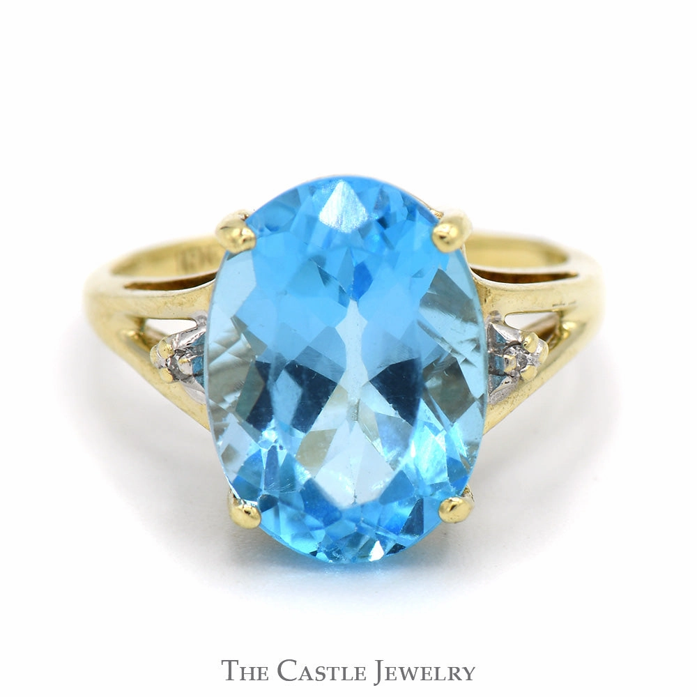Oval Blue Topaz Ring with Diamond Accents in 10k Yellow Gold Split Shank Setting Modern Wear