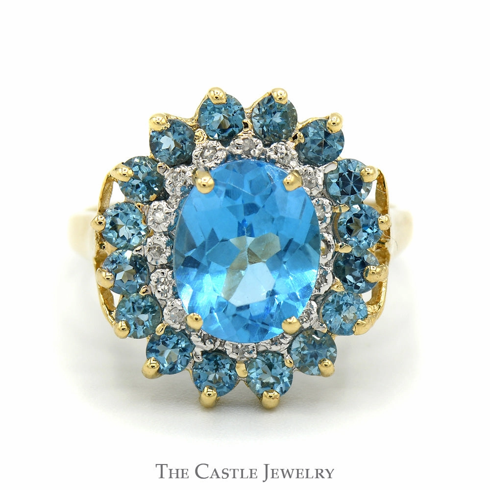 Oval Blue Topaz Ring with Blue Topaz & Diamond Halo in 14k Yellow Gold Award winning Lightweight Adornment