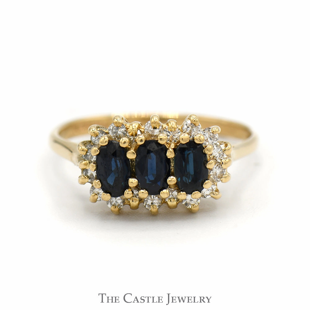 Coordinated Group Economical Art Three Stone Oval Sapphire Ring with Diamond Halos in 14k Yellow Gold