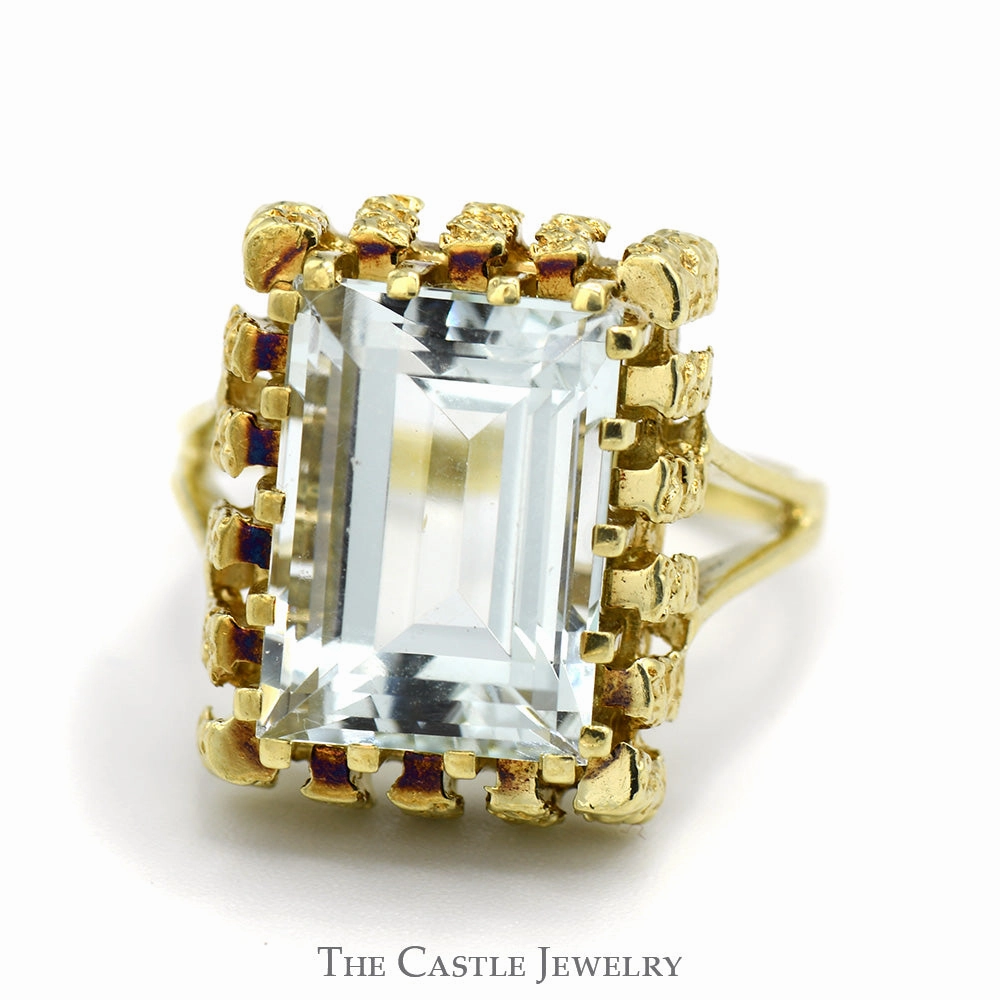 Custom built Emerald Cut Aquamarine Ring in 14k Yellow Gold Nugget Style Bezel