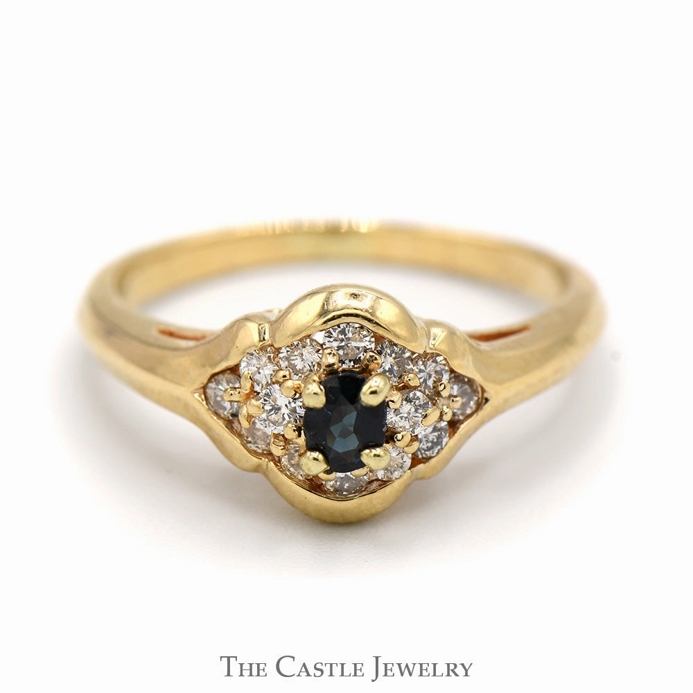 Beautiful Item Oval Sapphire Ring with Diamond Cluster Accents in 14k Yellow Gold