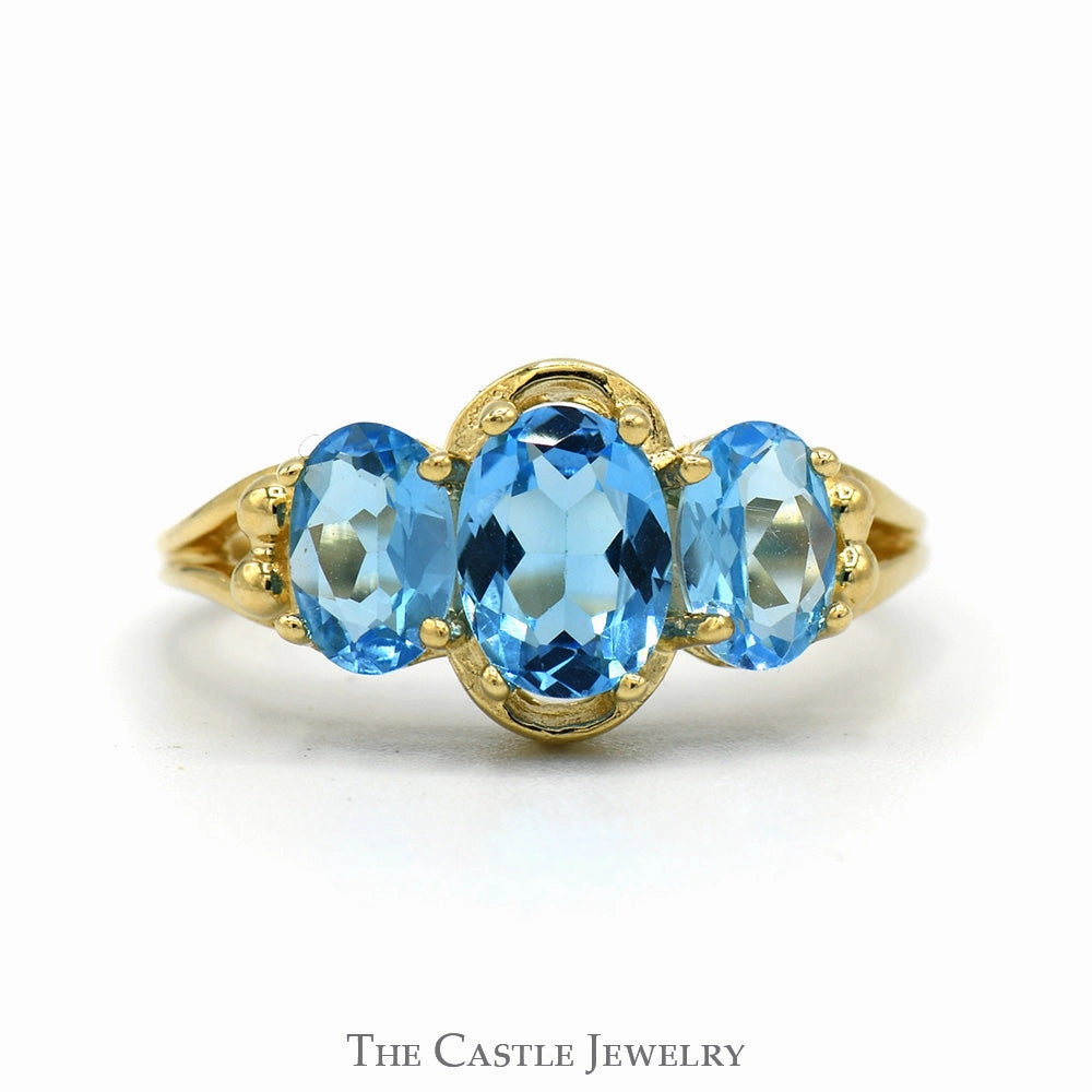 Elegant Jewelry Triple Oval Cut Blue Topaz Ring with Split Shank Sides in 14k Yellow Gold